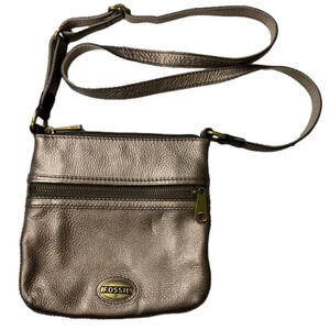 FOSSIL Explorer metallic pewter leather mini crossbody with adjustable strap.